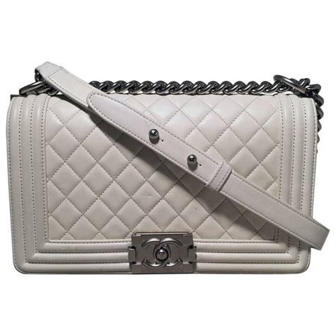 chanel white jacket boy bag|Chanel boy small quilted bag.